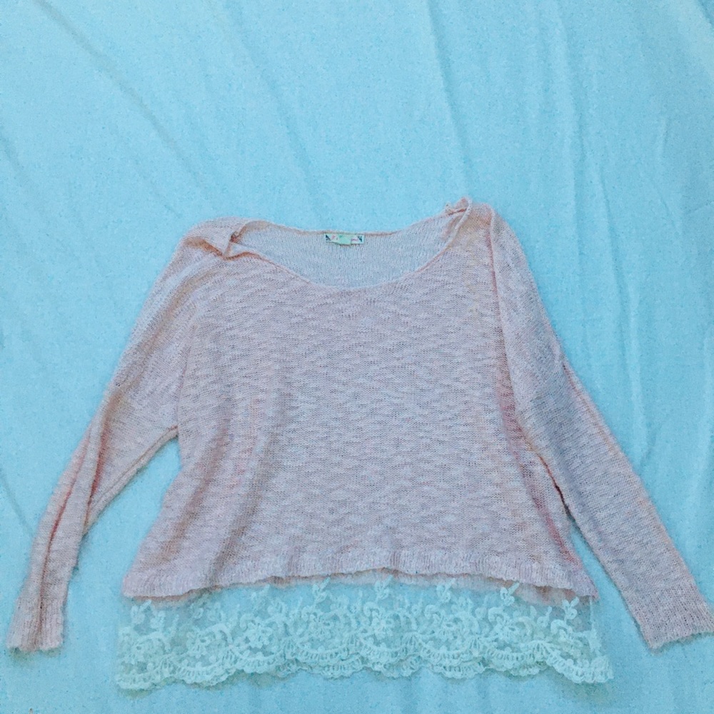 Light pink sweater.